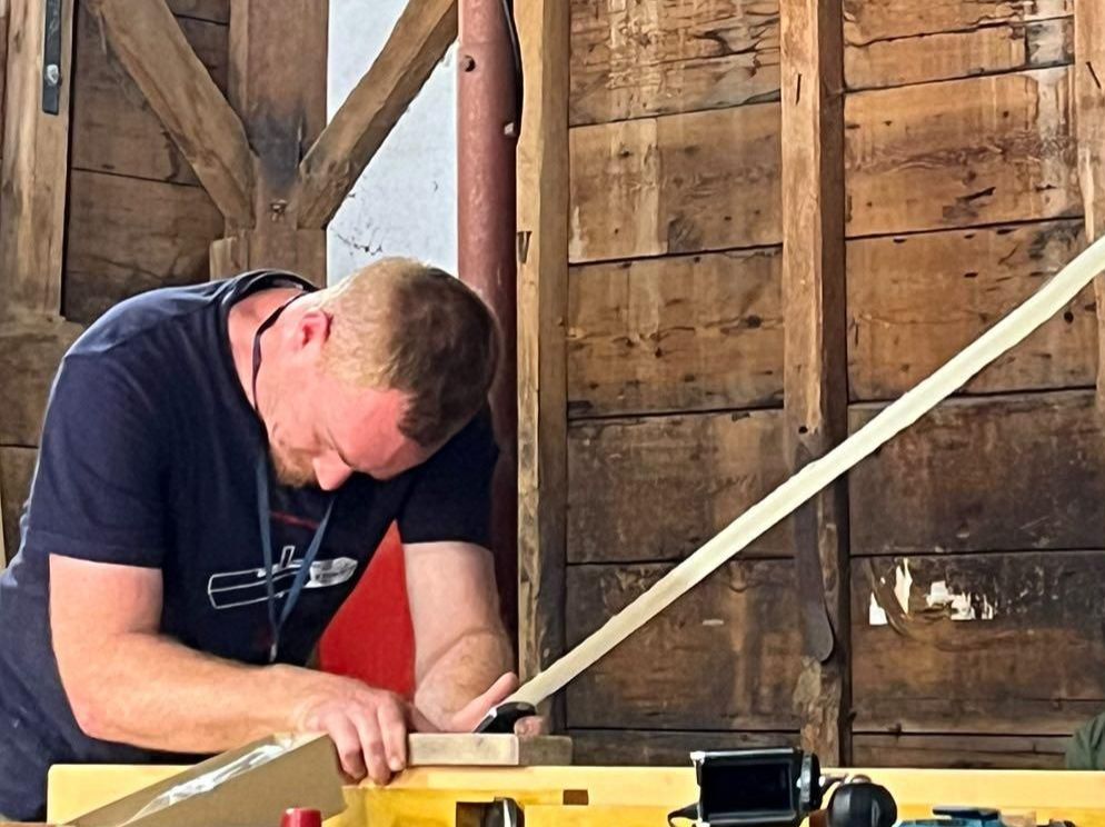 Greg competing in the First Japanese Woodworking Festival in Mercer, Main at Never Stop Building Headquarters held in 2023